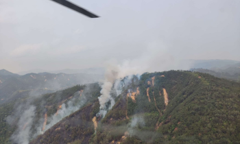 yl23411永利官网登录应急救援直升机 全面出动扑灭广东多地山火